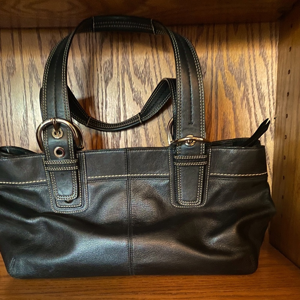 Pleated black leather bag